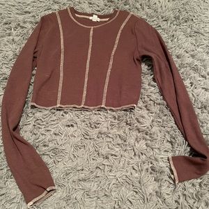 Long sleeved crop top.